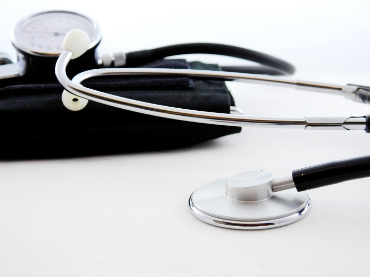 nurse measuring blood pressure